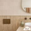 Angled In-Wall Toilet With Rectangle Antique Brass Buttons