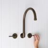 Melbourne Swivel Spout + Double Handle Taps Antique Brass
