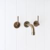 Melbourne Wall Spout + Double Handle Taps Antique Brass