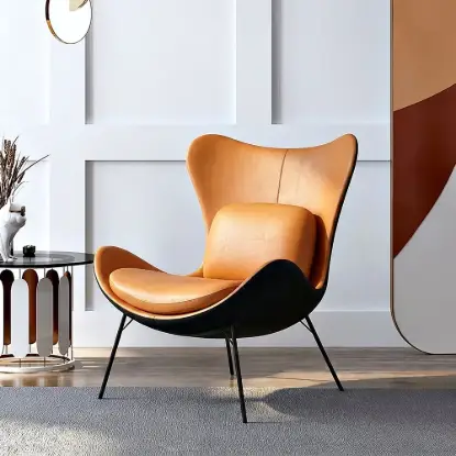 Picture of Faux Leather Wingback Slipper Accent Chair with Pillow & Metal Legs – Orange