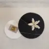 Modern Round Nesting Coffee Table Set 2-Piece Black and White Stone Top Gold Base