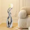 Silver Sculpture with Illuminated Sphere Art Decor