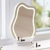 Lumio White Rotating Lighted Makeup Vanity with Charging Station & Mirror
