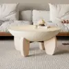 Picture of Curva 30" Round Concrete-Look Fiberglass Coffee Table with Wood Legs – Beige – Whitewash