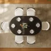 Modern 47"-79" Extendable Black Wood Dining Table with Fluted Base, Seats 4-6
