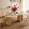 Modern 71" Oval Natural Faux Travertine Dining Table with Fluted Base & Storage