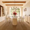 Modern 71" Oval Natural Faux Travertine Dining Table with Fluted Base & Storage