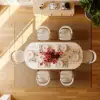 Modern 71" Oval Natural Faux Travertine Dining Table with Fluted Base & Storage