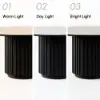 Aura 47" Round Black Faux Travertine Sintered Stone Dining Table, Fluted Base, Seats 4