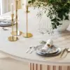 Aura 47" Round Whitewash Faux Travertine Sintered Stone Dining Table, Fluted Base, Seats 4