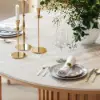 Aura 47" Round Natural Faux Travertine Sintered Stone Dining Table, Fluted Base, Seats 4