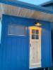 Picture of Traditional Beige Pine Outdoor Sauna, Sloped Roof, Viewing Window, Wood-Fired Heater