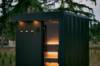 Picture of Cube Outdoor Wood-Fired Sauna in Deep Forest Green, Vertical Timber Cladding, Narrow Glass Door
