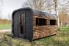 Picture of Rectangular Outdoor Steam Sauna Room, Redwood, Black and Brown Two-Tone Exterior, Multi-Window, Spacious Interior