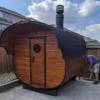 Picture of Commercial Barrel Steam Sauna Room with Solid Timber Panels, Black Tile Roof, Octagonal Window