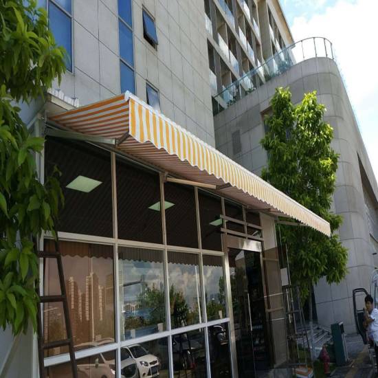 Picture of Folding Retractable Awning, Manual Crank or Electric, for Balconies, Gardens and Shopfronts