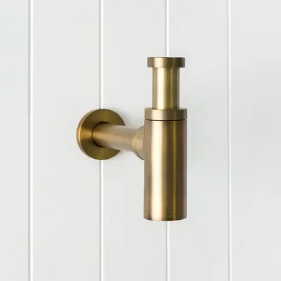 Antique brass basin bottle trap